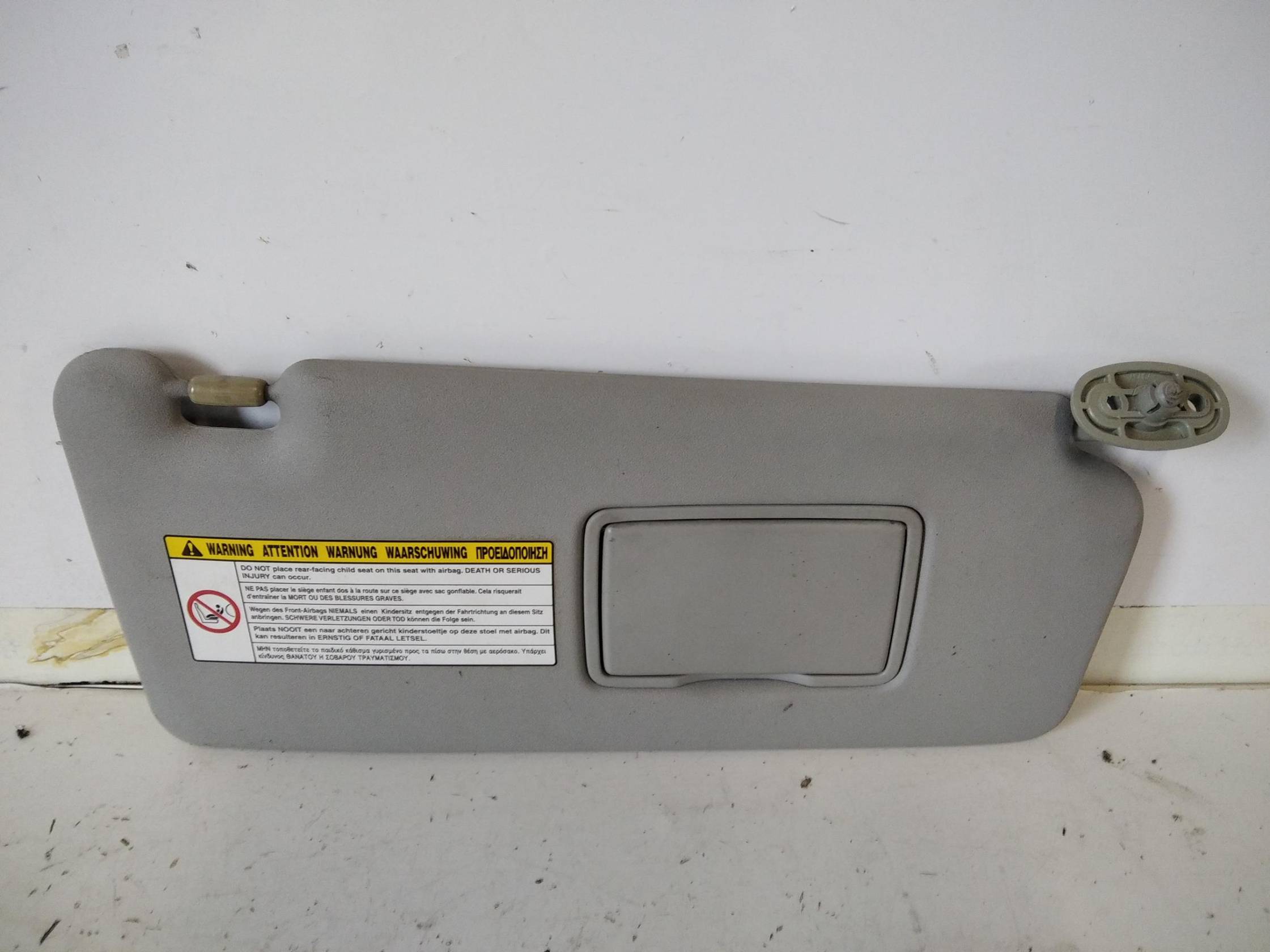 Aletta parasole parabrezza dx.